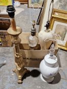Four table lamps, one giltwood effect, two in glass and a further white floral decorated example (4)