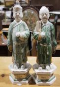 A pair of plaster/polychrome partial glazed Chinese style figures, a Chinese ceramic figure of an