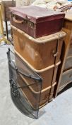 Large canvas, wood and metal bound suitcase, a smaller red suitcase and a metal fireguard (3)