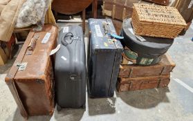 Large leather suitcase with metal fittings, a modern Samsonite suitcase, another leather suitcase