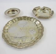 Silver ashtray, Birmingham 1933, maker's mark rubbed, the bowl engraved with text, 11cm diameter,