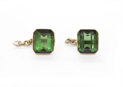 Pair of emerald-cut green tourmaline cufflinks in gold-coloured mounts with chain link (missing back