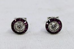 Pair white gold-coloured metal, diamond and ruby stud earrings, each with diamond approx. 0.5ct