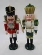 Two German painted wooden novelty nutcrackers by Seiffener Volkskunst modelled as a hussar and a