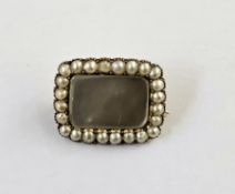 Georgian gold-coloured memorial brooch of rectangular design set with pearls around a mother-of-