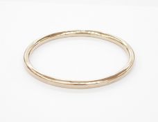 9ct gold hollow bangle of plain circular form, approx. 12g