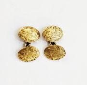 Pair of 18ct gold cufflinks by Saunders and Shepherd, London 1899, of oval form with engraved