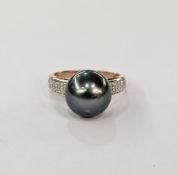 9ct gold, black pearl and diamond ring with small diamonds to the shoulders, finger size N1/2