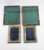 Silver photograph frame by Carr's of Sheffield, 1994 of rectangular form with bow, swag and harebell