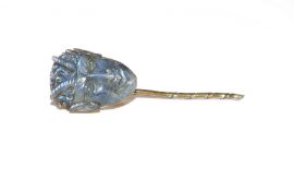 Late 19th/early 20th century carved labradorite satyr's head mounted on a gilt metal stickpin, the