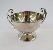 Silver small pedestal sugar bowl of Art Nouveau style, having pair free scroll handles and on