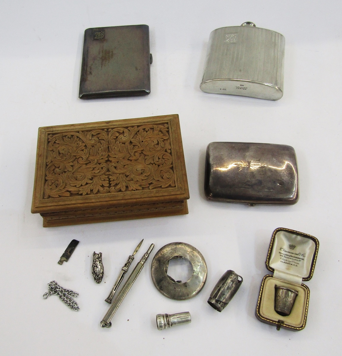 Small silver cigarette case, curved, Chester 1899, 9cm, two silver bottle mounts, a white metal