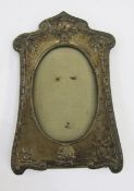 Edwardian silver photograph frame by Boots Pure Drug Company, Sheffield 1908, of shaped design