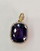 18ct yellow gold, amethyst and diamond pendant, the rounded rectangular faceted amethyst