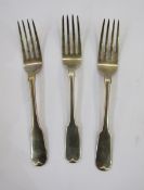 Three George III Irish silver table forks, fiddle pattern, crest engraved, Dublin 1818, maker