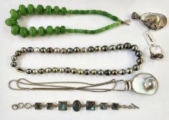 Mother-of-pearl pendant, a stone set necklace, a green glass bead necklace, a metal and pearl