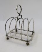 Late Victorian silver four-division toast rack, round arch pattern, Sheffield 1894, 3ozt