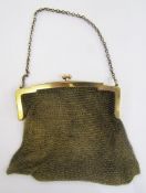 9ct gold mesh purse, ball fastening, with metal chain handle, 167 grams approx total.