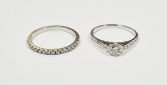 18K white gold and diamond solitaire ring having diamond shoulders, the principal stone 0.4ct,