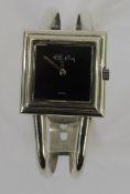 Lady's silver Roy King bracelet watch, London 1973, the square black dial with signature, on