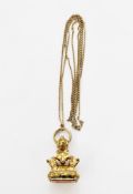 Victorian gilt metal fob seal of ornate design with a fox's head and foliate scrolls, the agate