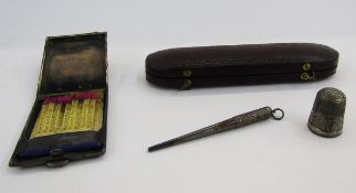 Silver bodkin with engraved foliate decoration, the screw off lid revealing two screw on bodkin