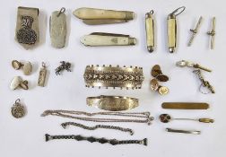 Victorian silver bangle, clover leaf decorated, two silver and mother-of-pearl fruit knives, and