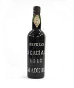 Early bottle of Madeira circa 1910 the bottle labelling reading 'Reserve Sercial 1910 Madeira',