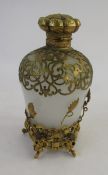 French gilt metal and opaque glass scent bottle, the mushroom stopper scallop-shaped and panelled,