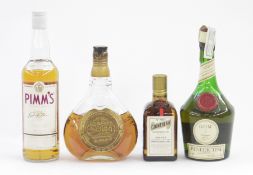 Cointreau liqueur extra dry Angers 70% proof 12 fl oz, together with a bottle of Johnnie Walker