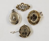 Victorian gilt metal memorial brooch, the central swivel compartment with a panel of coiled hair and