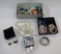 A quantity of bead necklaces, diamante and other bracelets and costume jewellery