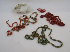 Assorted necklaces including carnelian bead necklace, twig coral necklace, seed pearl necklace (