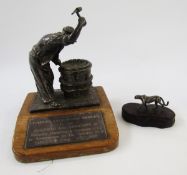 Silver filled model of a barrel maker coopering, Birmingham 1985, maker GWL, on an oak base with