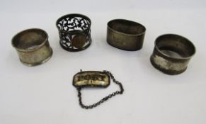George III silver wine label 'Port', London 1800, maker's mark JA, and four various silver napkin