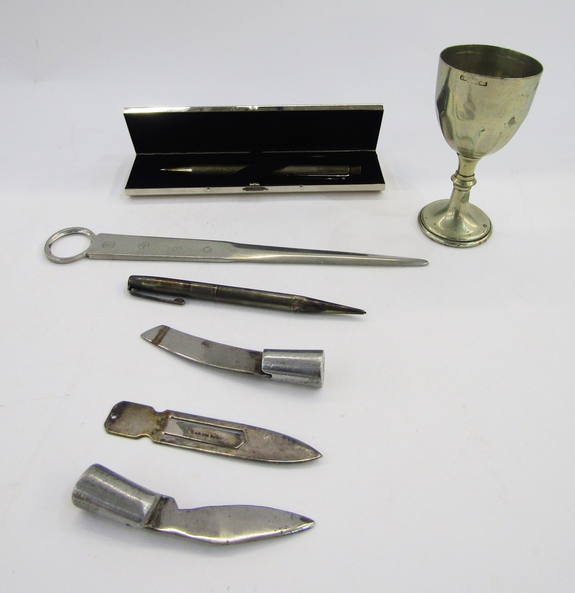 Silver propelling pencil with engine turned decoration, a silver Sheaffer propelling biro with