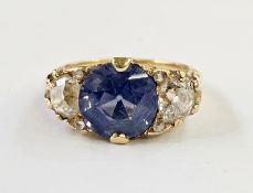 Antique diamond and blue stone dress ring, the circular central stone possibly pale blue sapphire,