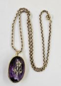 Gold-mounted and amethyst stone pendant set with pearl and small diamond floral spray, on 9ct gold