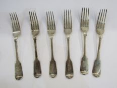 Set of six matched 19th century silver table forks, fiddle pattern, all crest engraved with shield