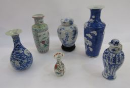Collection of Chinese porcelain to include a shouldered tapering vase with prunus decoration on a