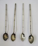 Four Chinese silver coloured metal bamboo effect straw pattern spoons