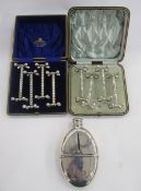 Silver plated hip flask of oval design with pull-off cover, 14cm high, a set of four silver plated