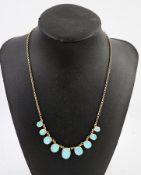 9ct gold and opal necklace set nine graduated oval opals on integral circular link chain, weight