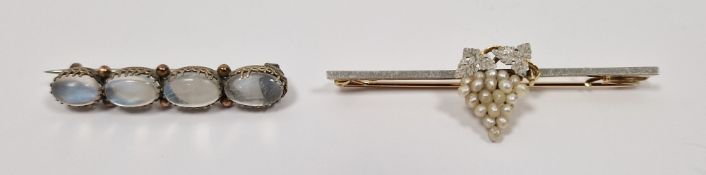 Victorian silver coloured bar brooch set with four cabochon stones, possibly moonstones,  in a