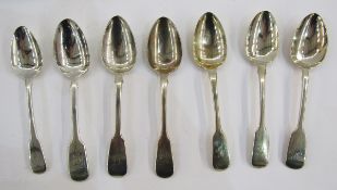Matched set of seven silver dessert spoons, 19th century, fiddle pattern, various makers and