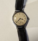 LOT WITHDRAWN; Early 20th century silver cased octagonal shaped Rolex wristwatch, the circular