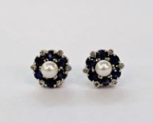 Pair of white metal, pearl, sapphire and diamond stud earrings, each set with a central cultured