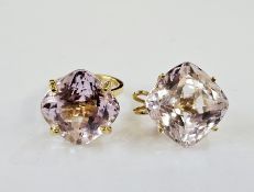 18ct gold modern dress ring set with large kunzite cushion-shaped cut stone in high claw setting and