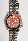 Seiko automatic diver's 200m stainless steel wristwatch, the red dial with white circular hour