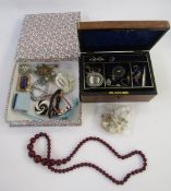 A string of red amber coloured beads, Egyptian style metal buckle, steel buckle, diamante brooches